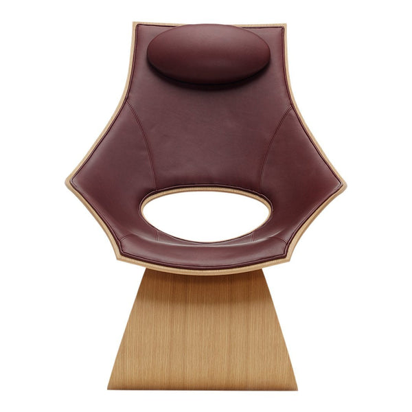 Modern chair featuring a rich burgundy leather seat and a natural wood base with a unique, sculptural design.