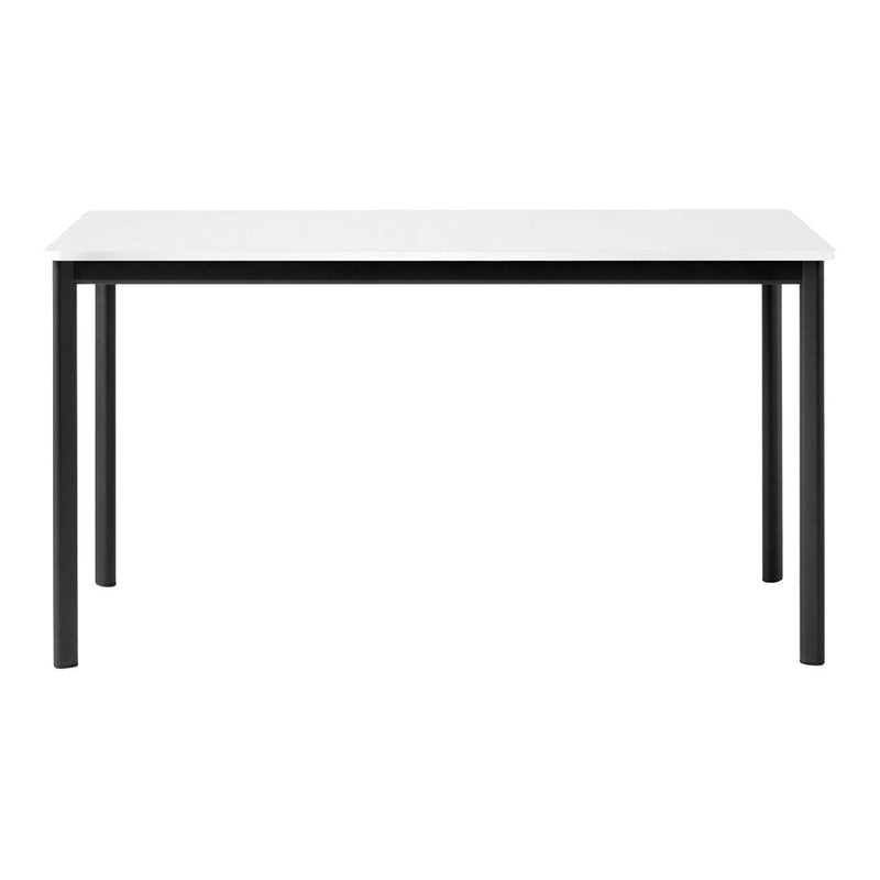 White tabletop with sleek black legs, featuring a minimalist design and smooth surface, perfect for modern decor.