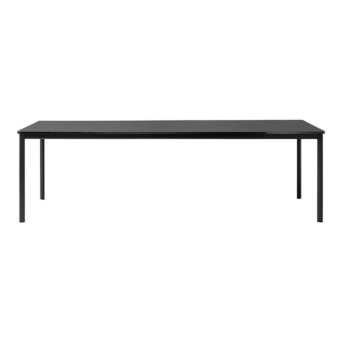 Sleek black rectangular dining table with a smooth surface and minimalist design, perfect for modern decor.