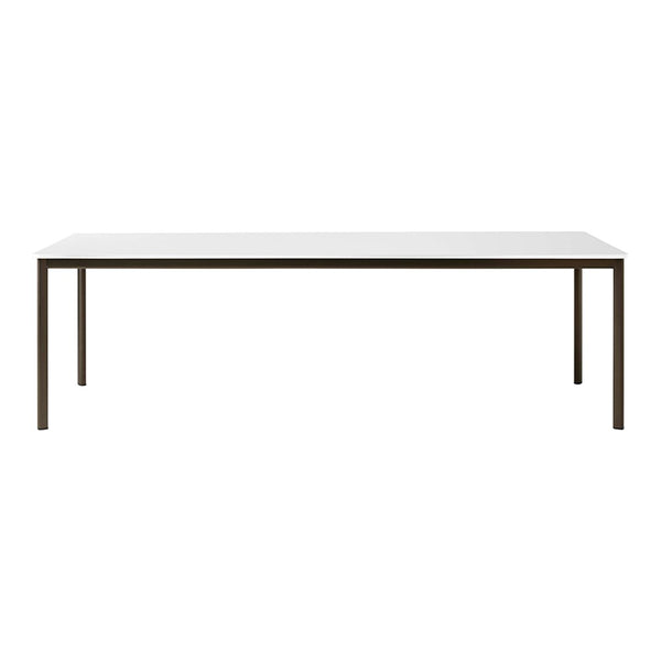 Modern rectangular table with a sleek white surface and minimalist brown legs, perfect for contemporary spaces.