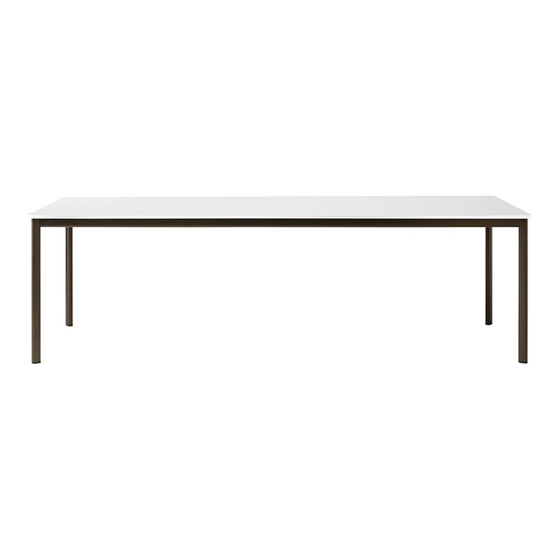Modern rectangular table with a sleek white surface and minimalist brown legs, perfect for contemporary spaces.
