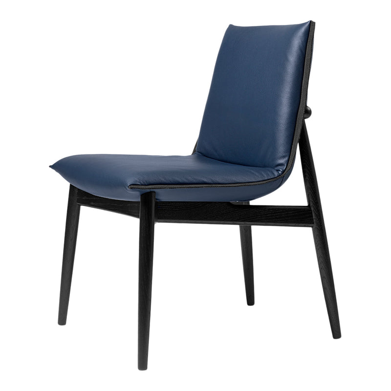 Navy blue leather chair with a sleek, minimalist design and contrasting black wooden frame.