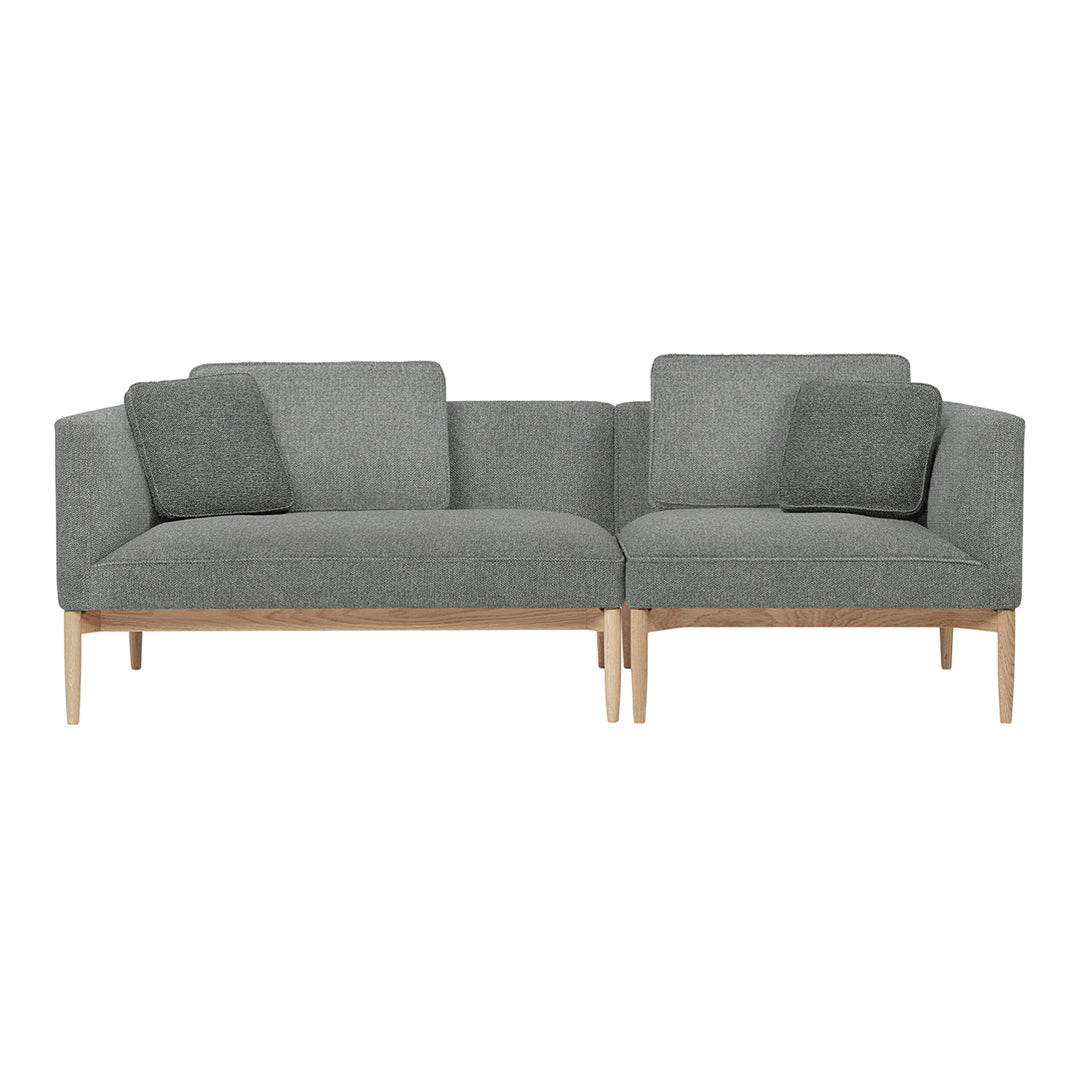 Modern gray loveseat with subtle patterns and light wooden legs. Ideal for contemporary living spaces.