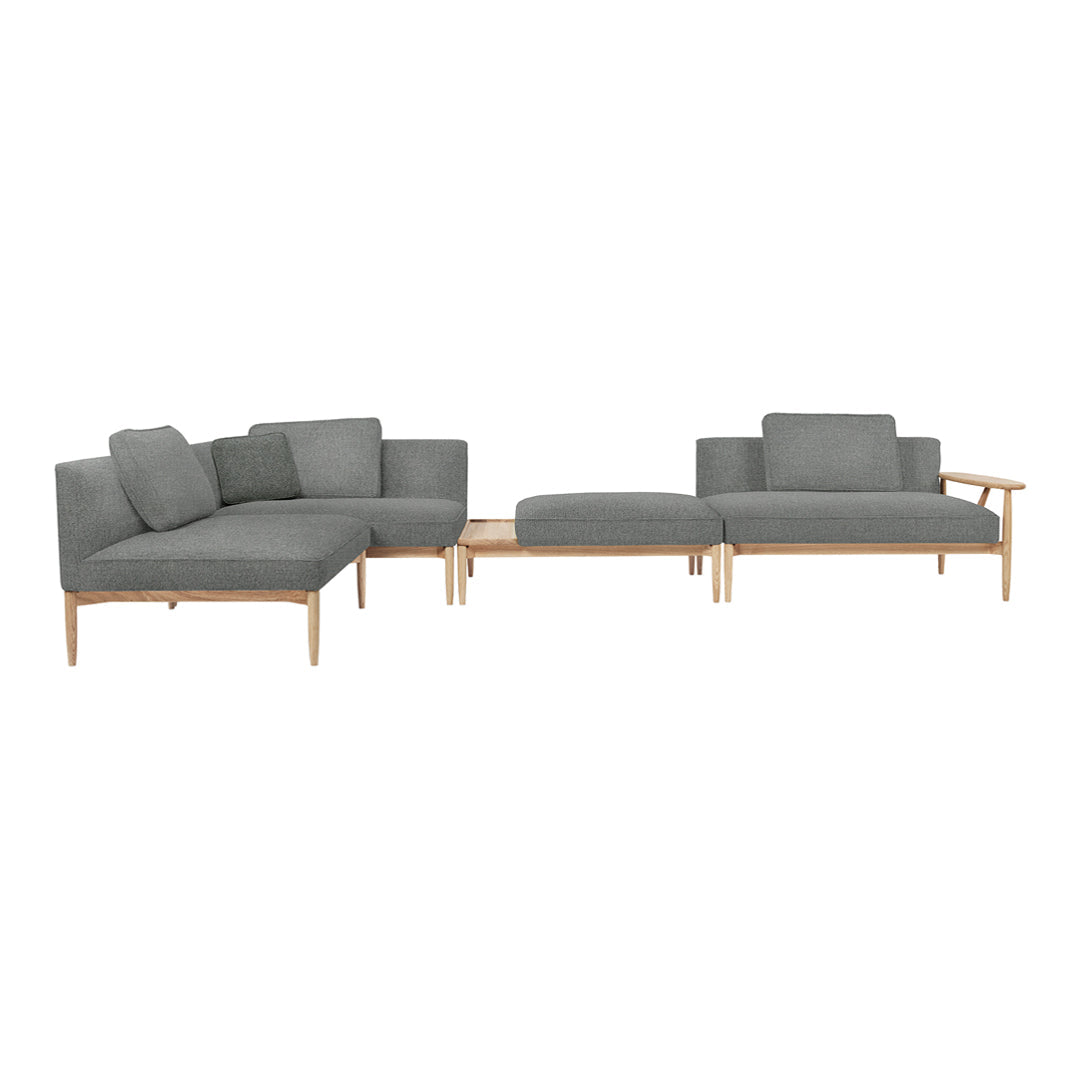 Modern gray upholstered sectional sofa with a natural wood frame and clean lines, perfect for contemporary decor.