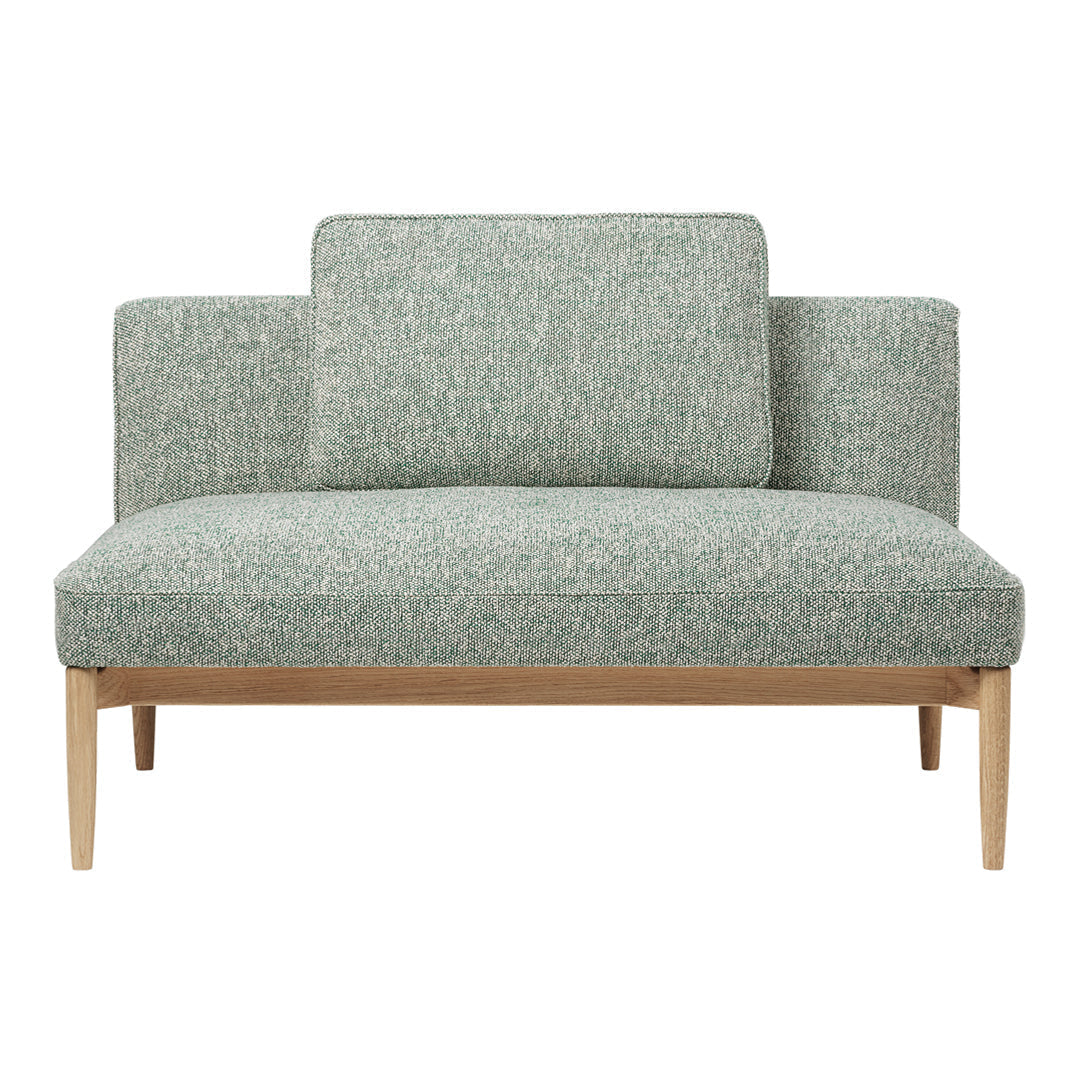 Light green textured loveseat with minimalist wooden legs, featuring subtle patterns for modern decor.