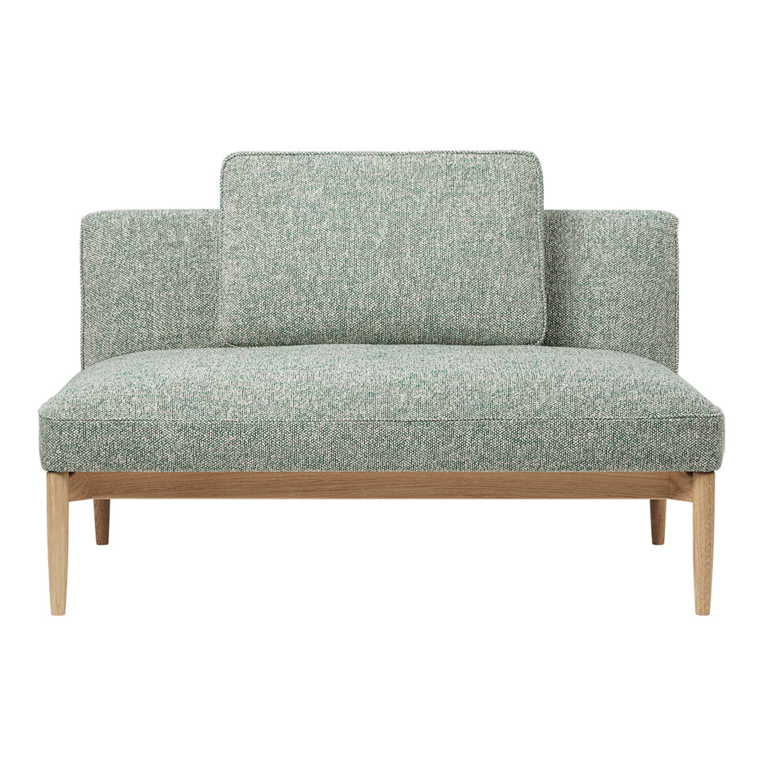 Light green textured loveseat with minimalist wooden legs, featuring subtle patterns for modern decor.