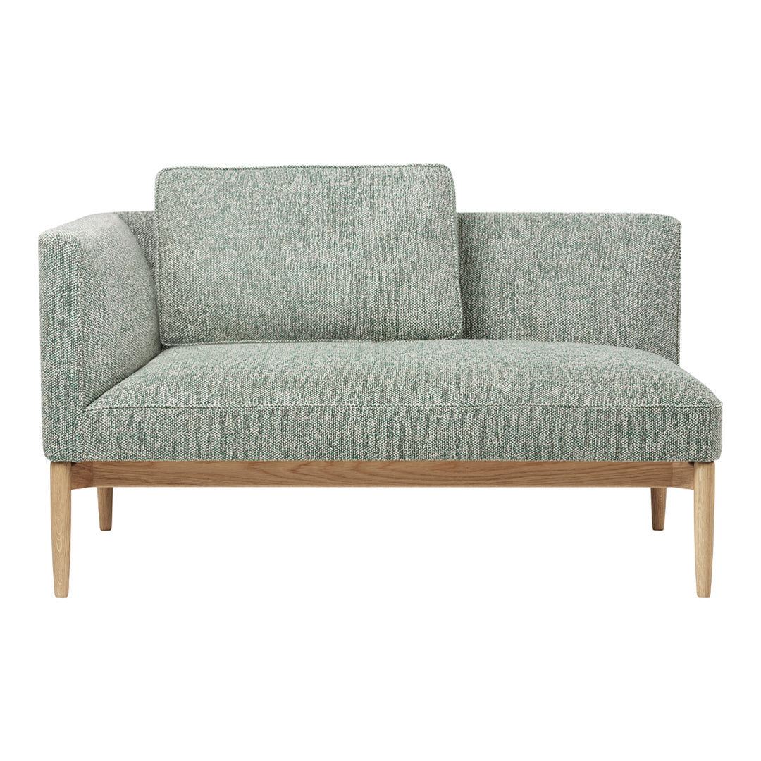 Mint green textured fabric sofa with minimalist wooden legs, featuring a modern, clean design. Perfect for contemporary decor.