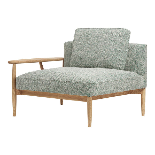 Light green upholstered chair with a subtle textured pattern and natural wood armrests. Modern and stylish design.