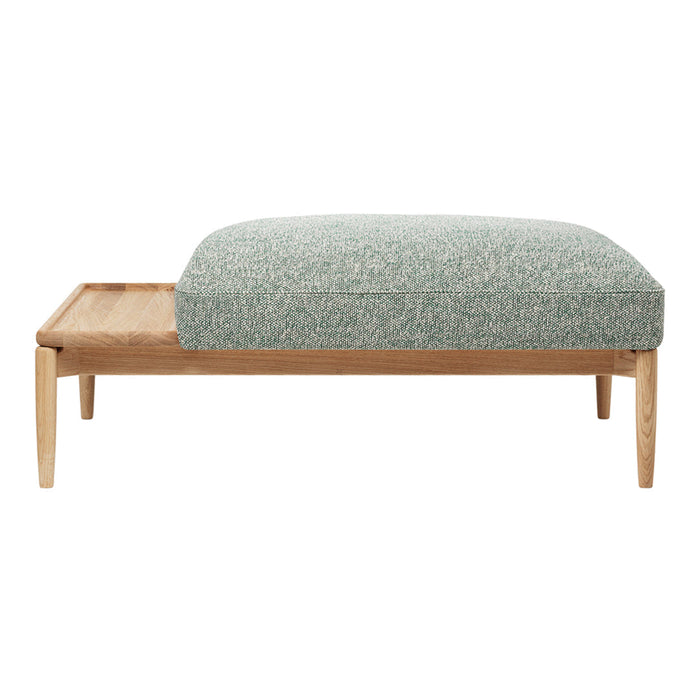 Light blue textured fabric cushion with wood base, featuring a modern design and minimalistic style.