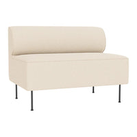 Beige upholstered bench with a rounded backrest and sleek black metal legs, perfect for modern decor.