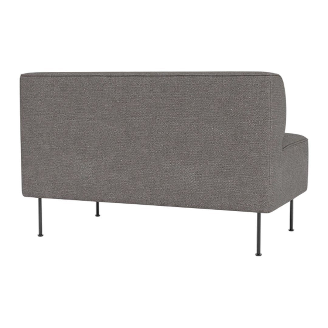Gray upholstered sofa with a textured finish and sleek black legs, showcasing a modern minimalist design.