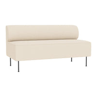 Cream-colored modern sofa with a seamless design, featuring a rounded back and sleek black metal legs.