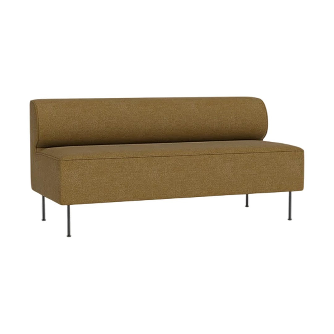 Sleek brown sofa with a smooth texture and minimalistic design, featuring a rounded back and slender metallic legs.