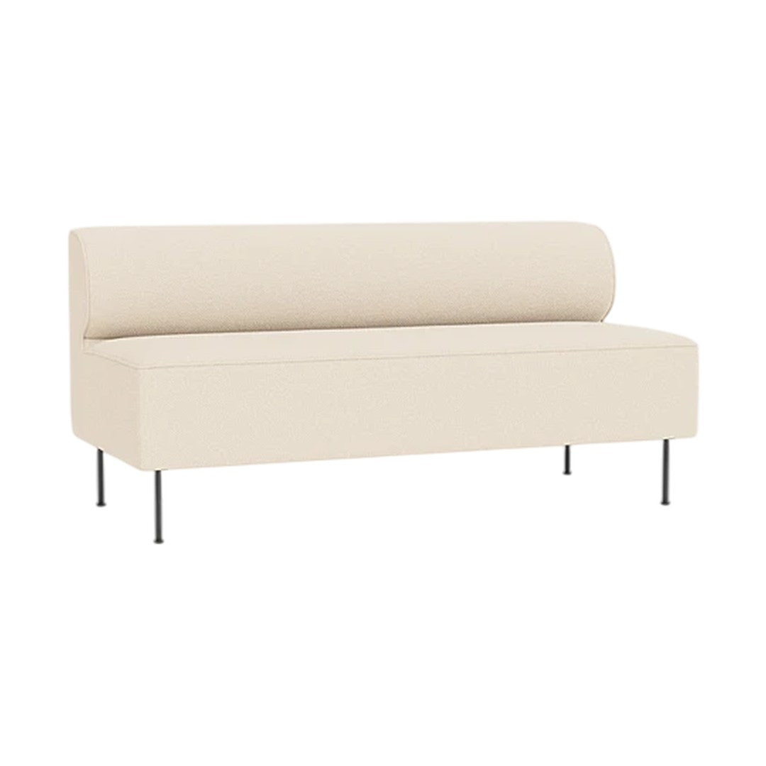 Cream-colored minimalist sofa with a smooth, cylindrical backrest and sleek metal legs. Perfect for modern decor.