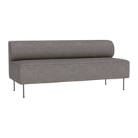 Gray sofa with a smooth, minimalist design and cylindrical backrest, featuring sleek metal legs.