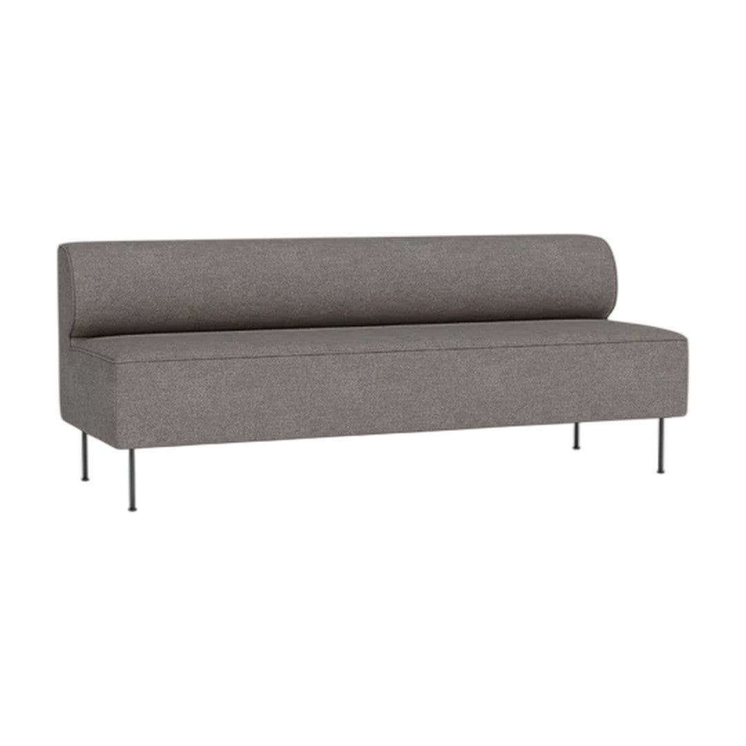 Gray upholstered sofa with a cylindrical back, minimalist design, and sleek metal legs. Perfect for modern decor.