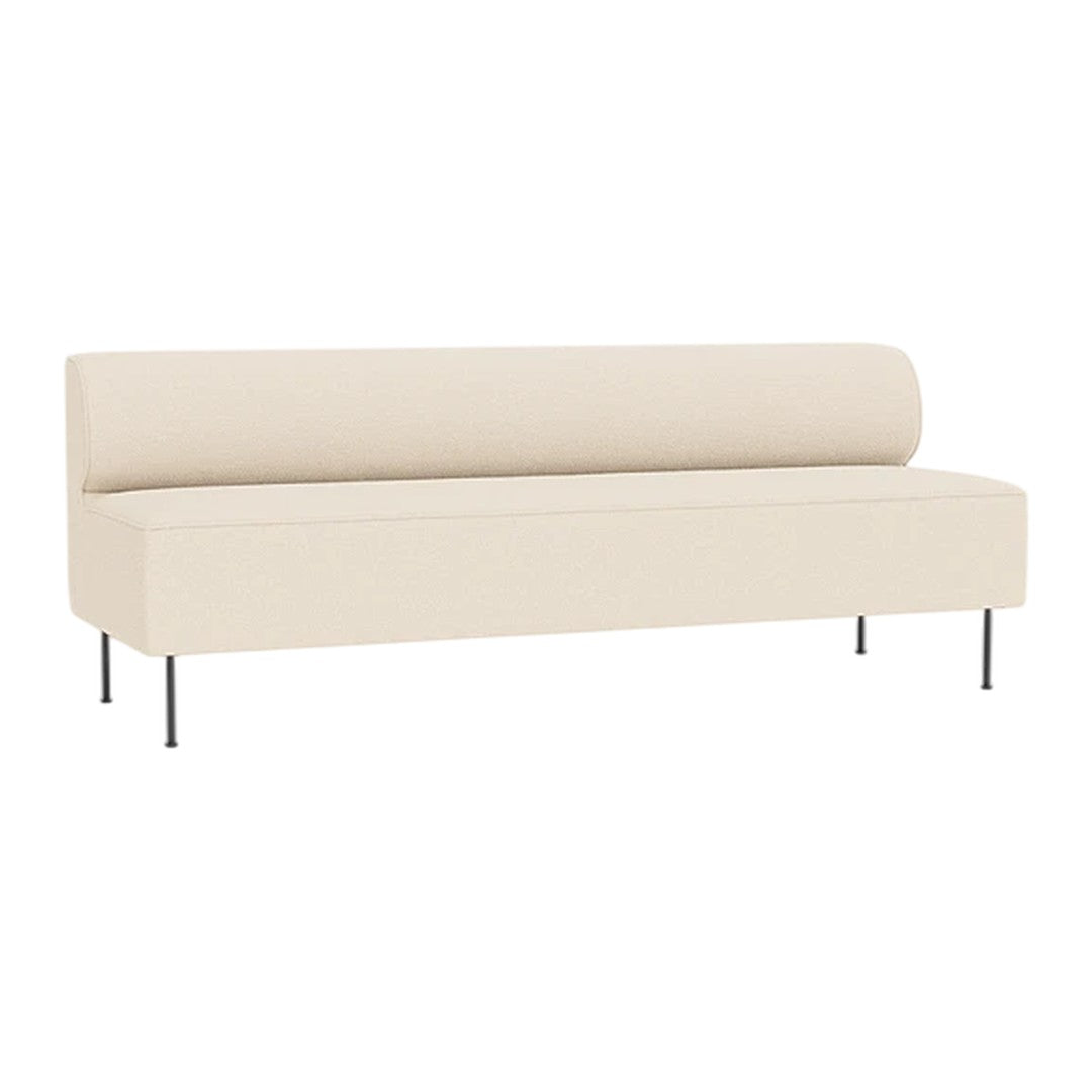 Beige modern sofa with a smooth, minimalist design and simple, solid color upholstery.
