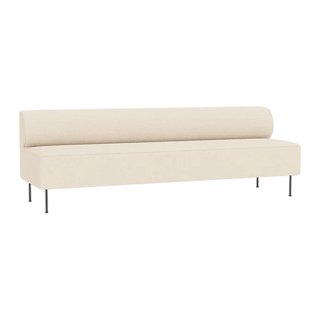Cream-colored minimalist sofa with a sleek, smooth design and metal legs, perfect for modern decor.