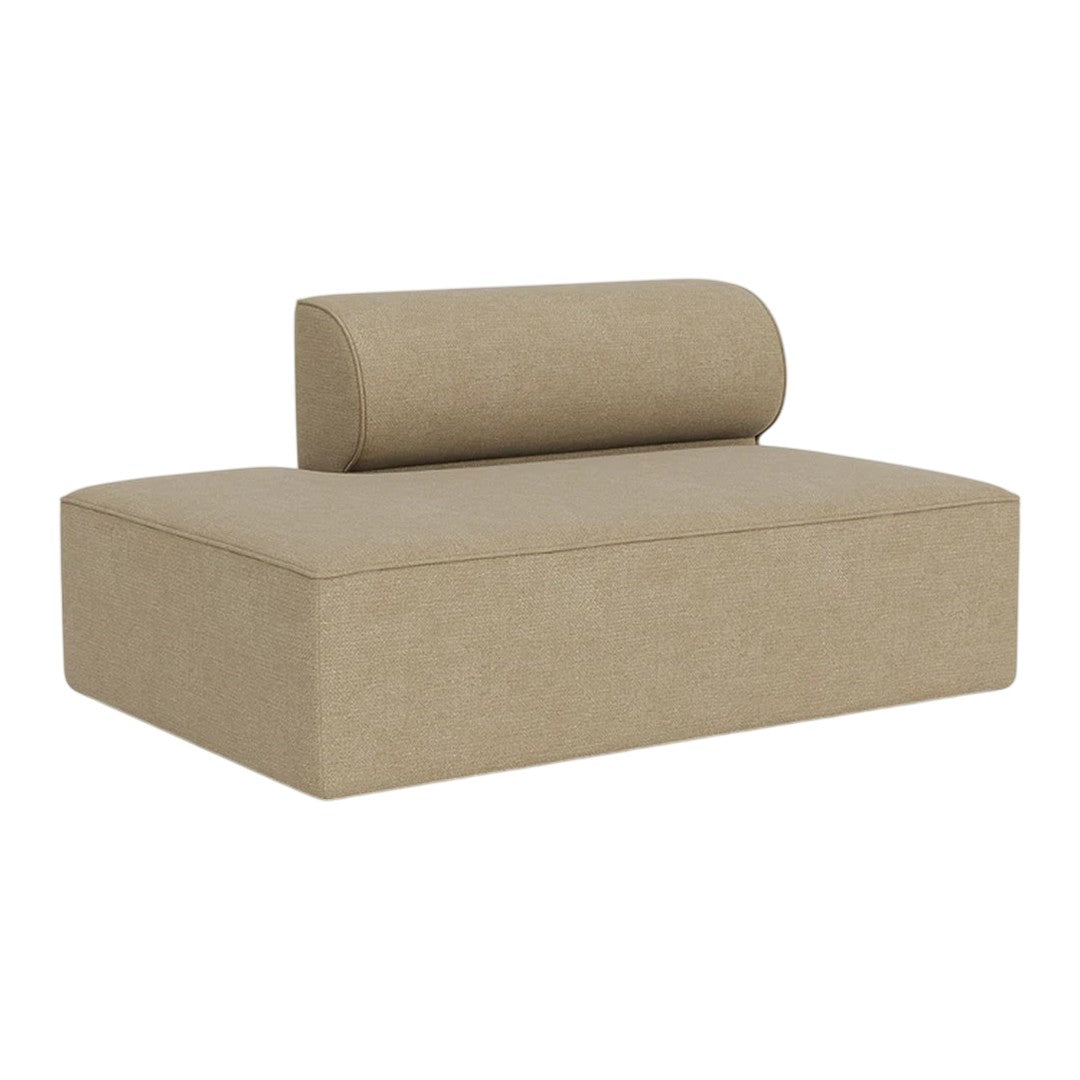 Beige upholstered lounge chair with a cylindrical backrest and smooth, minimalist design. Perfect for modern interiors.