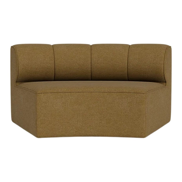 Curved sofa in warm mustard yellow fabric, featuring a smooth, solid pattern with subtle texture.