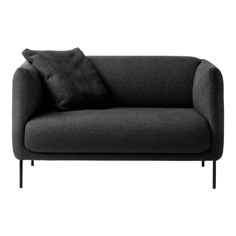 Modern black sofa with a textured fabric and a matching throw pillow, featuring clean lines and minimalist design.