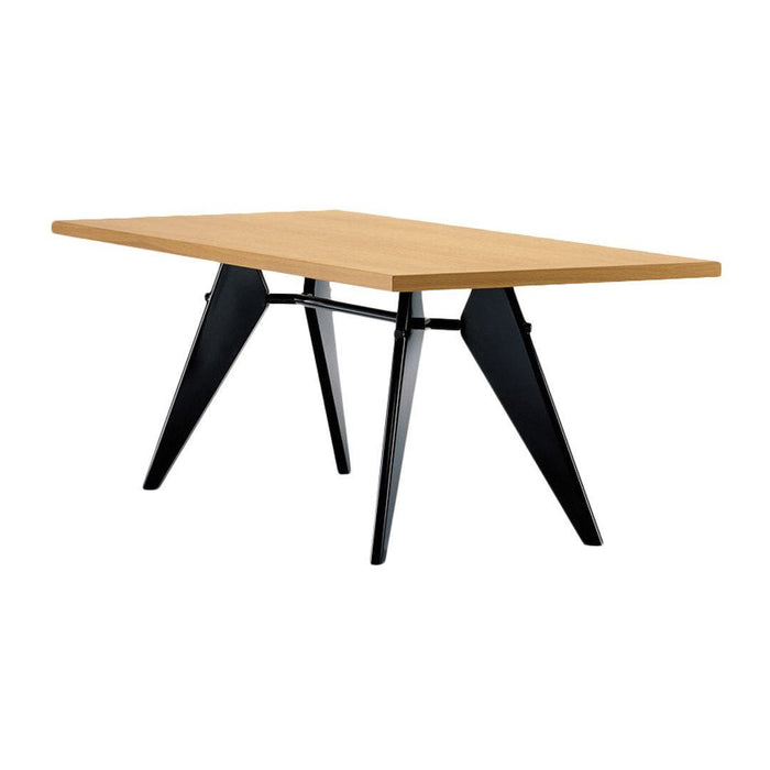 "Rectangular oak tabletop with clean wood grain, supported by sleek black metal legs."