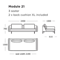 "Modern three-seater sofa in solid color with two extra-large back cushions, showcasing a clean and contemporary design."