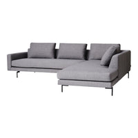 Gray sectional sofa with clean lines and soft fabric, featuring a minimalist design and three supportive cushions.