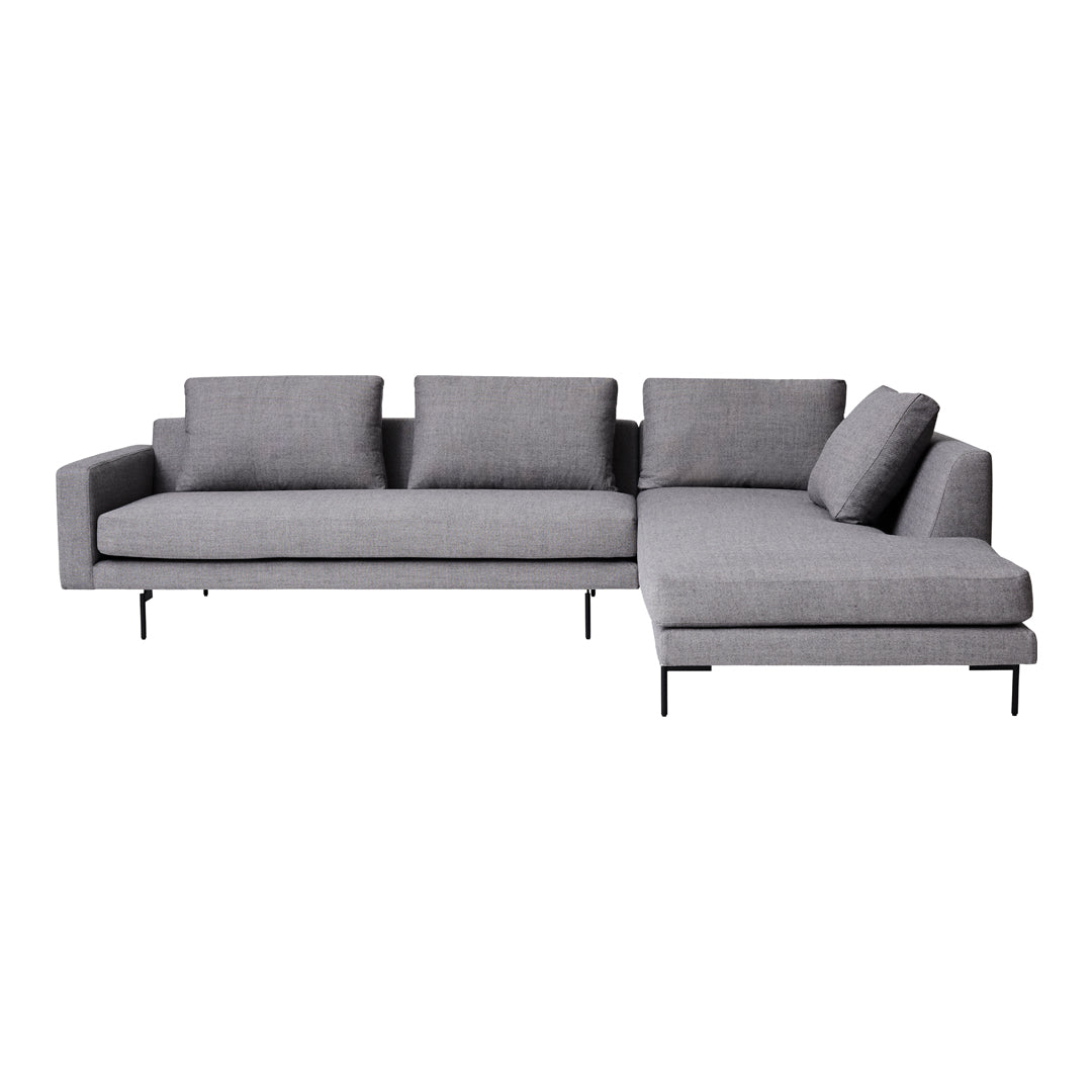 Gray modular sofa with clean lines and subtle texture, featuring minimalist design and sleek black legs. 
