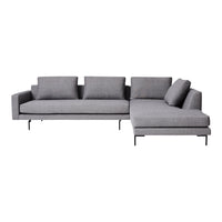 Gray sectional sofa with a sleek, modern design and textured fabric upholstery.