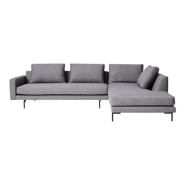 Gray sectional sofa with a sleek, modern design and textured fabric upholstery.