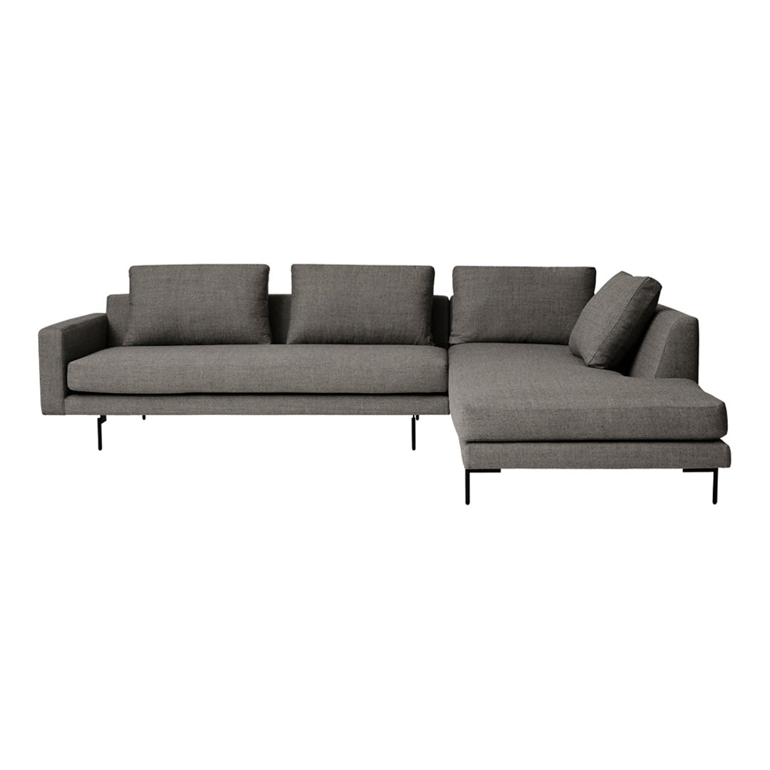 Gray sectional sofa with clean lines and subtle texture, featuring a modern design and plush cushions.