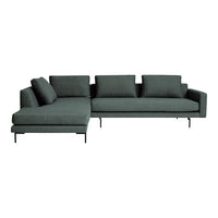 Modern dark green sectional sofa with smooth, textured fabric and sleek black metal legs.