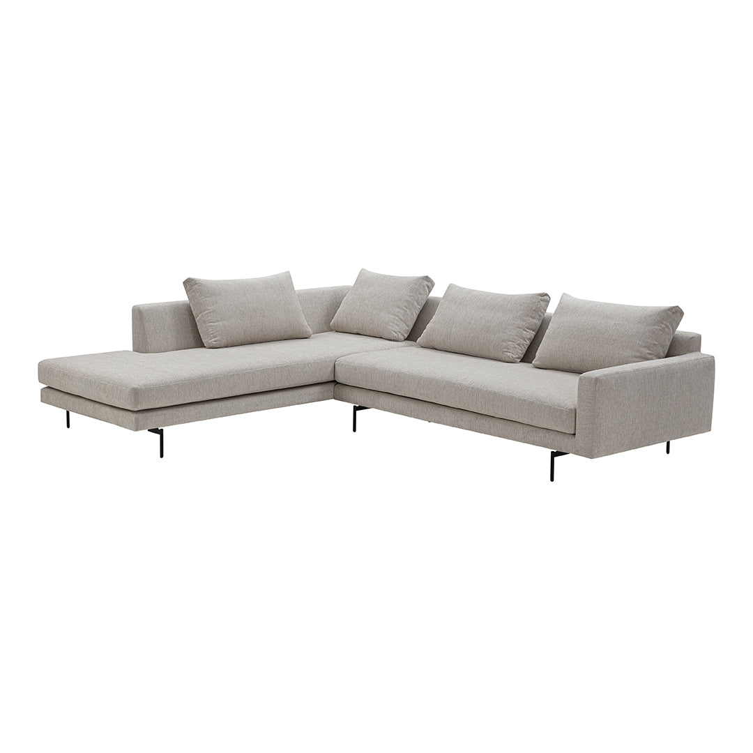 Light beige sectional sofa with subtle textured fabric and black metal legs, perfect for modern living spaces.