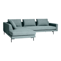 Light blue modern sectional sofa with a smooth fabric finish and minimalist design, featuring clean lines and cushions.