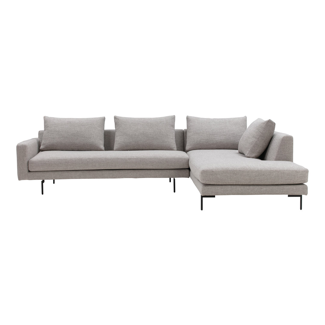 Gray L-shaped sectional sofa with plush cushions and sleek metal legs, featuring a minimalistic design.