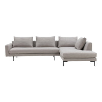 Light gray sectional sofa with clean lines and solid fabric upholstery, featuring matching cushions for added comfort.