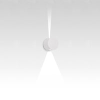 Minimalist white wall light with a sleek design and soft glow, emphasizing modern elegance and simplicity.