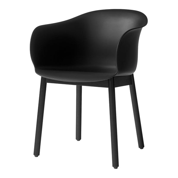 Black armchair with a smooth, solid color design and sleek legs, perfect for modern living spaces.