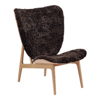 Brown plush upholstered chair with a textured, shaggy pattern and light wood frame. Ideal for cozy interiors.