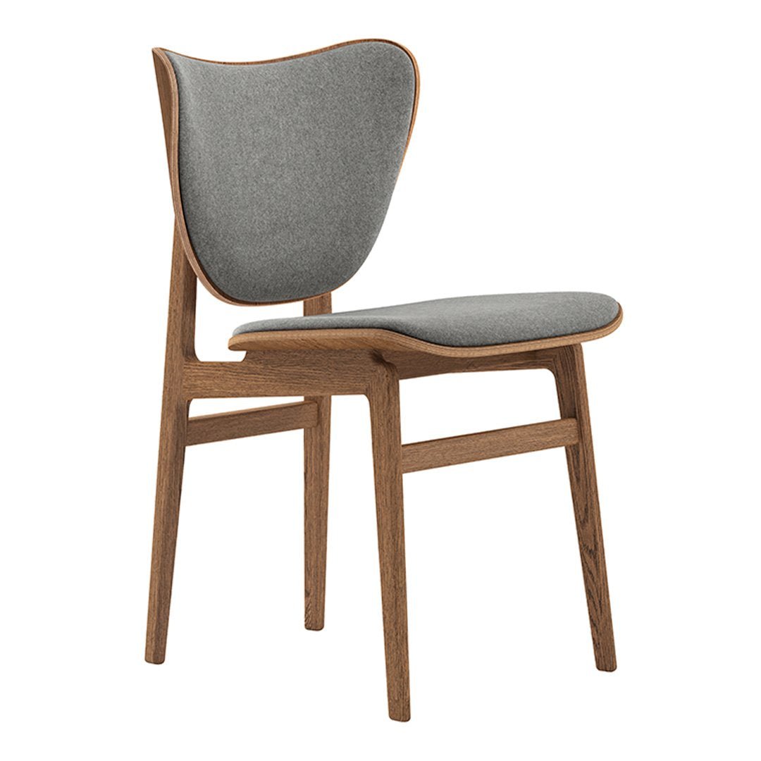 Gray upholstered chair with a wood frame, featuring smooth lines and a minimalist design. Ideal for modern decor.