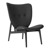 Stylish black upholstered chair with a smooth, modern design and subtle button detailing. Perfect for contemporary decor.