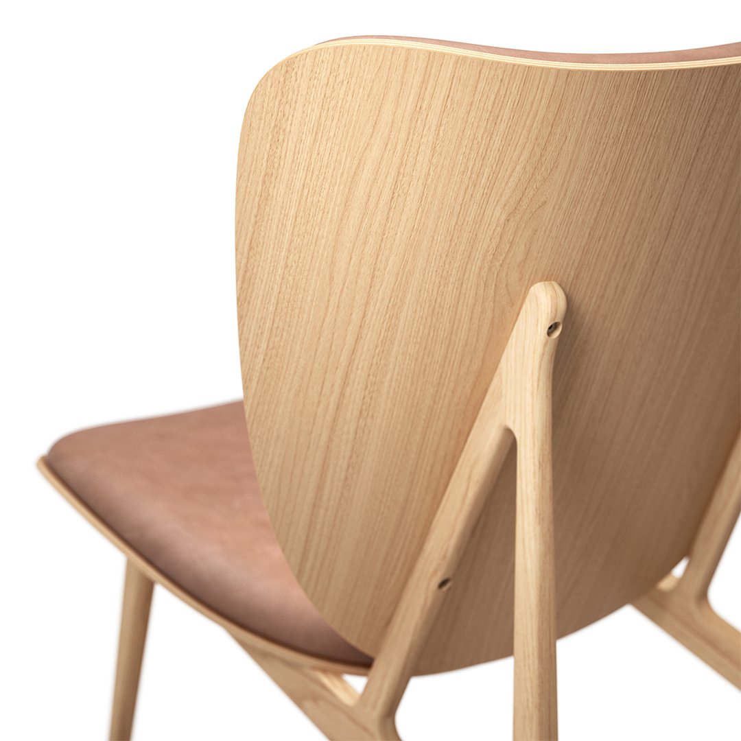 Natural wood finish with a smooth, light grain and soft brown leather seat create an elegant and modern look.