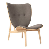 Gray upholstered chair with a minimalist design, featuring light wooden legs and subtle button details.
