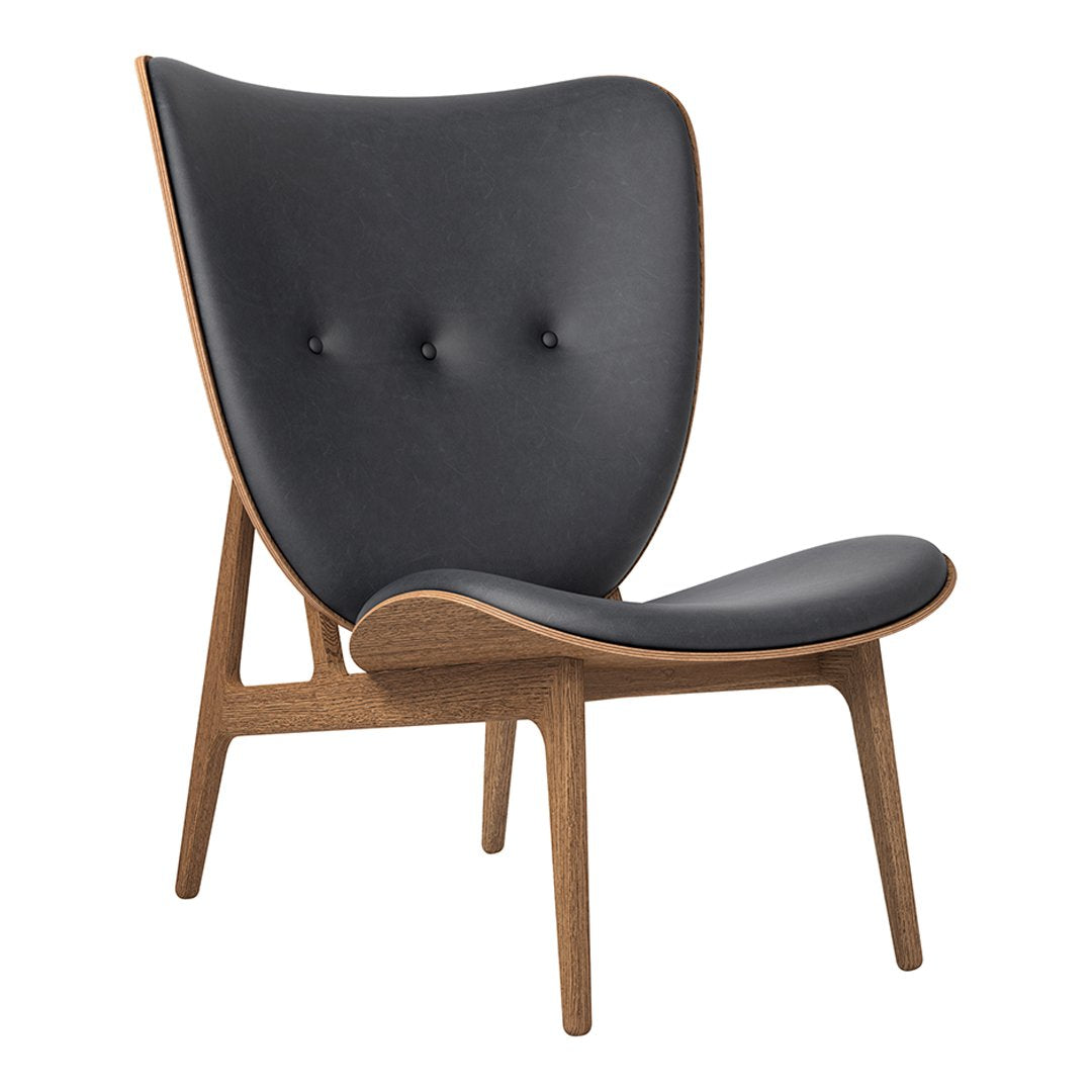 Black leather armchair with a smooth surface and natural wood legs, featuring sleek lines and a modern design.