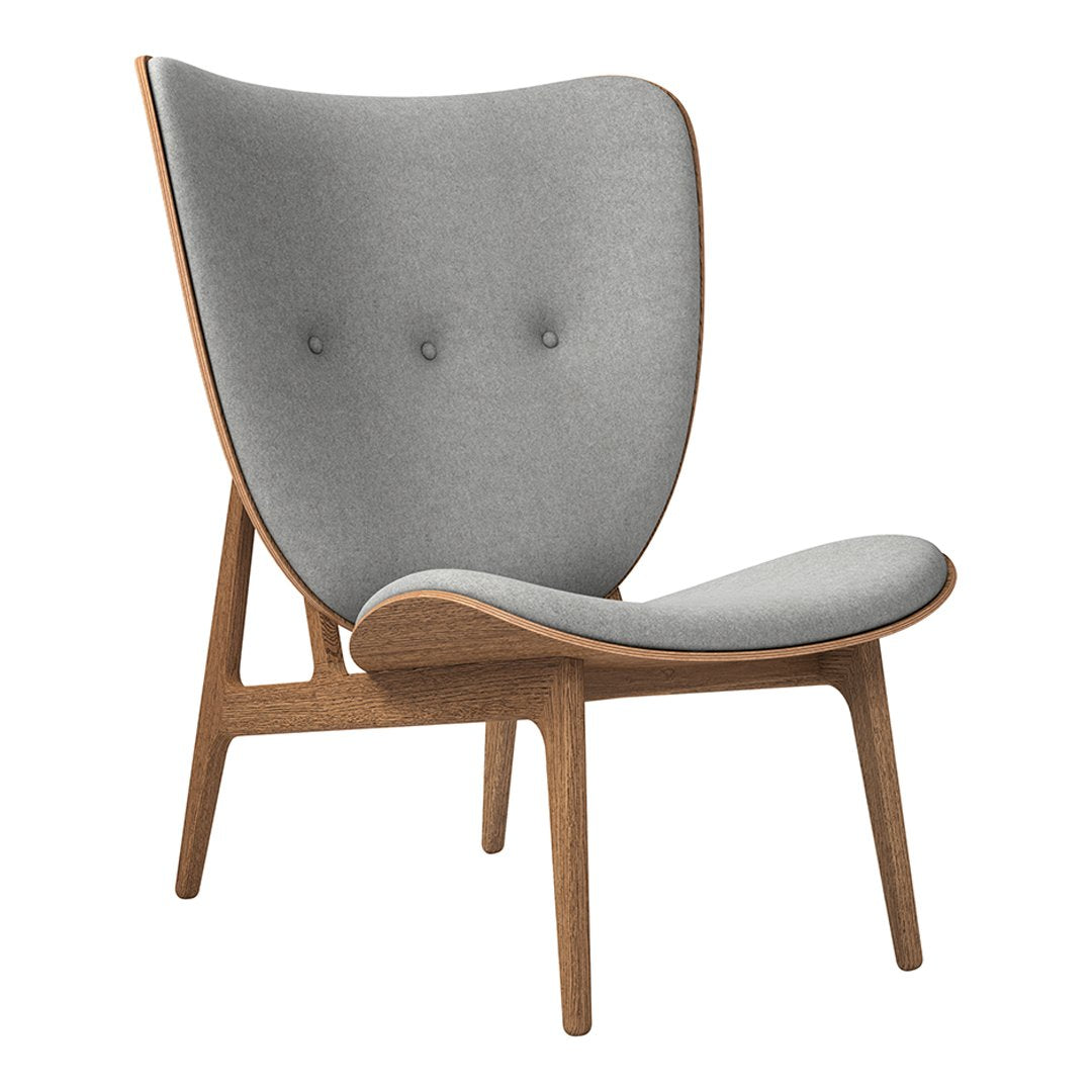 Gray upholstered chair with a smooth finish and wooden legs, featuring a minimalist design and subtle button accents.