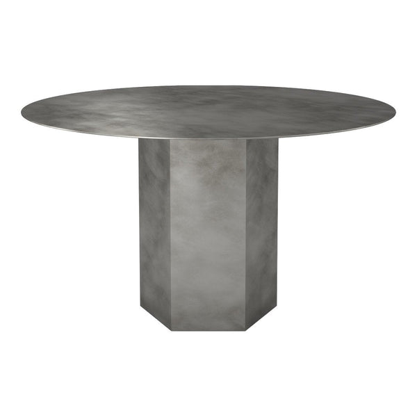 Round gray dining table with a polished finish and geometric base, creating a modern and sleek aesthetic.
