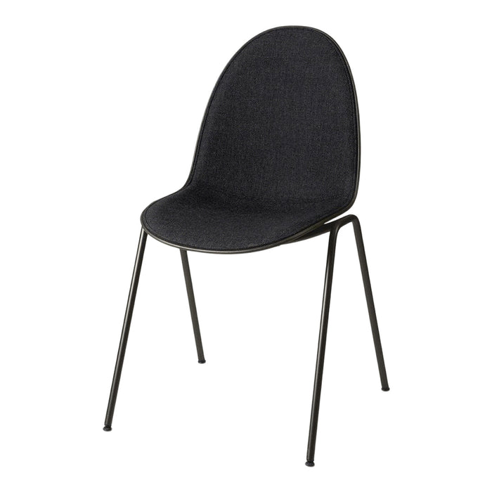 Black upholstered chair with a smooth, curved silhouette and slender metal legs. Modern and minimalist design.