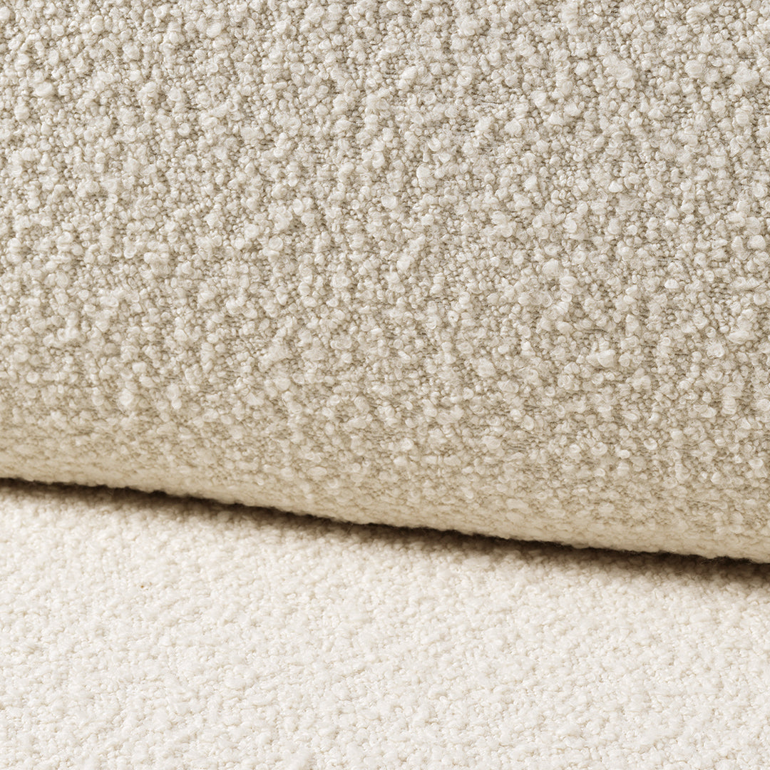 Soft beige textured fabric featuring a plush, cozy pattern with subtle variations in shades. Perfect for home decor.