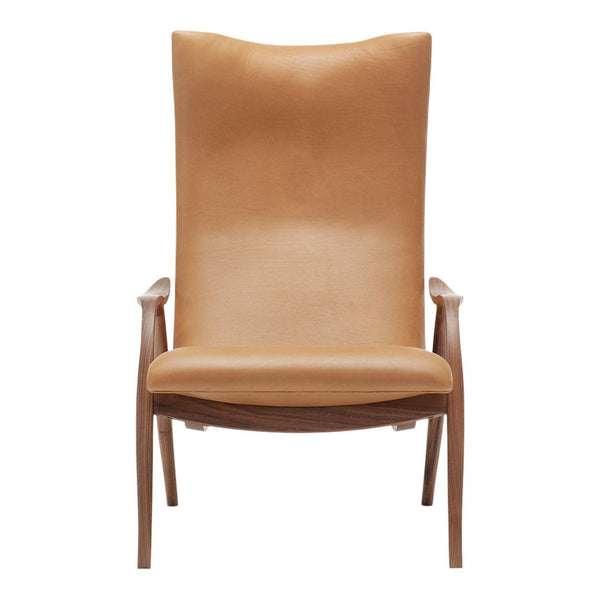 Tan leather accent chair with smooth, minimalist design and natural wood arms. Ideal for modern interiors.